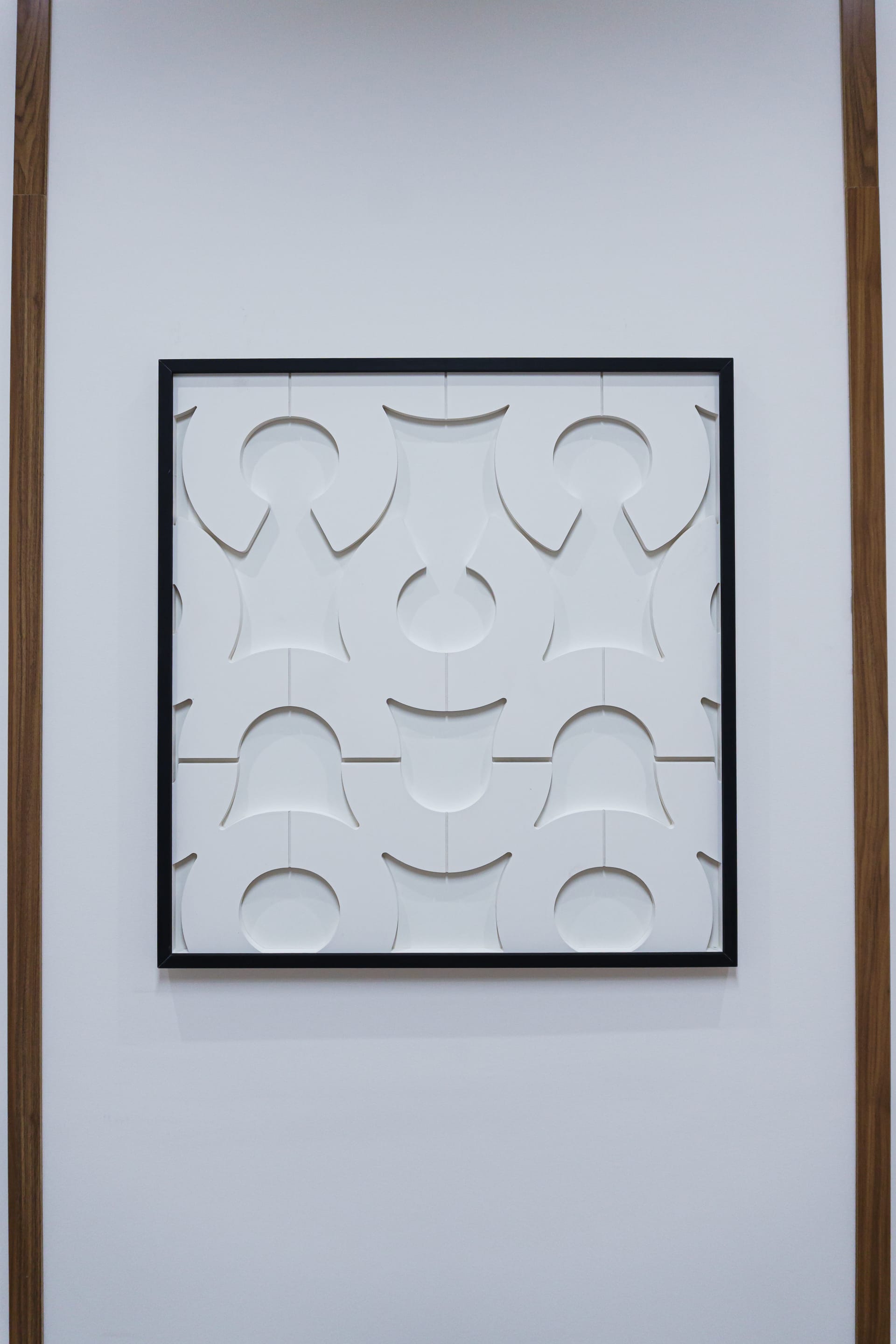 Branded patterned artwork inside a Tasees private office